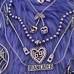 ISO - Souvenir Jewelry Riding Crop Earrings